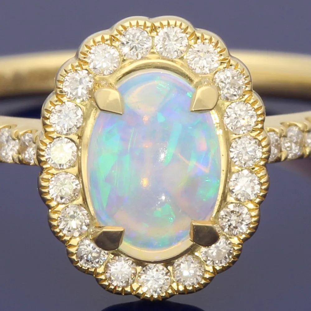 18ct Yellow Gold Oval Opal and Diamond Halo Ring