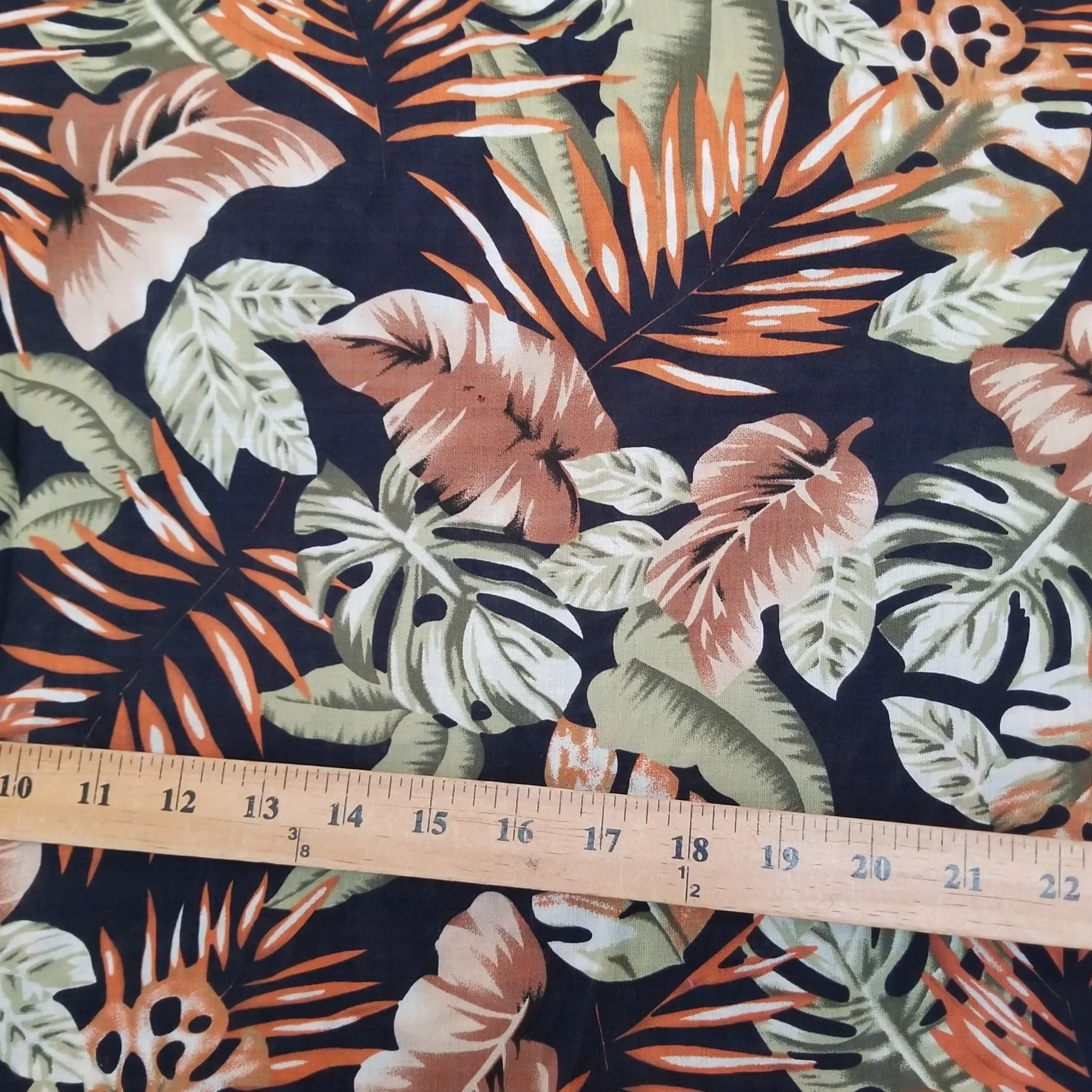 End of Bolt: 4-5/8th yards of Designer Deadstock Orange and Navy Foliage Resort Cotton Lawn 2.36 oz -remnant